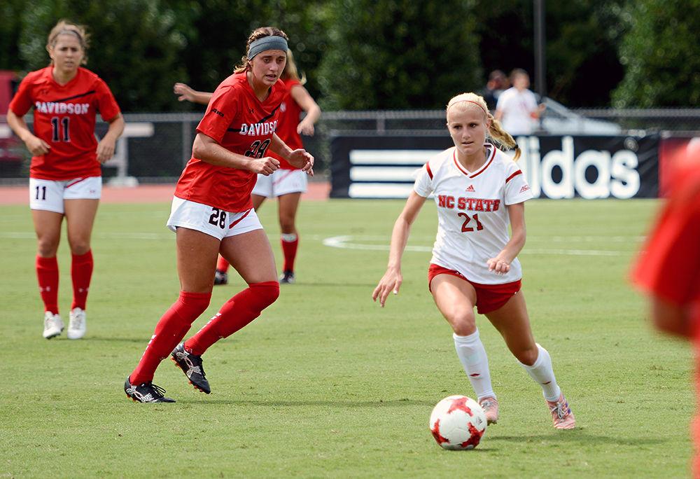 Sophomore midfielder Paige Griffiths looks for a pass forward. The NC State women's soccer team beat Davidson 4-0 at Dail Soccer Stadium on Sunday. Sept. 10.