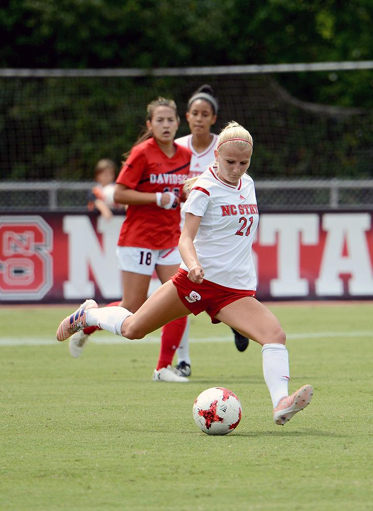 Sophomore midfielder Paige Griffiths kicks the ball for a long pass. The NC State women's soccer team beat Davidson 4-0 at Dail Soccer Stadium on Sunday, Sept. 10.