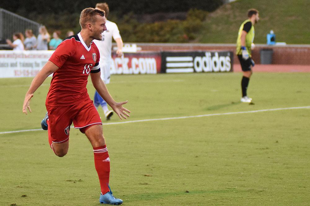 Senior midfielder Julius Duchscherer celebrates after scoring during the game against UNC Asheville. The Wolfpack would go on to win the game 3-0 in Dail Soccer Stadium on Tuesday.