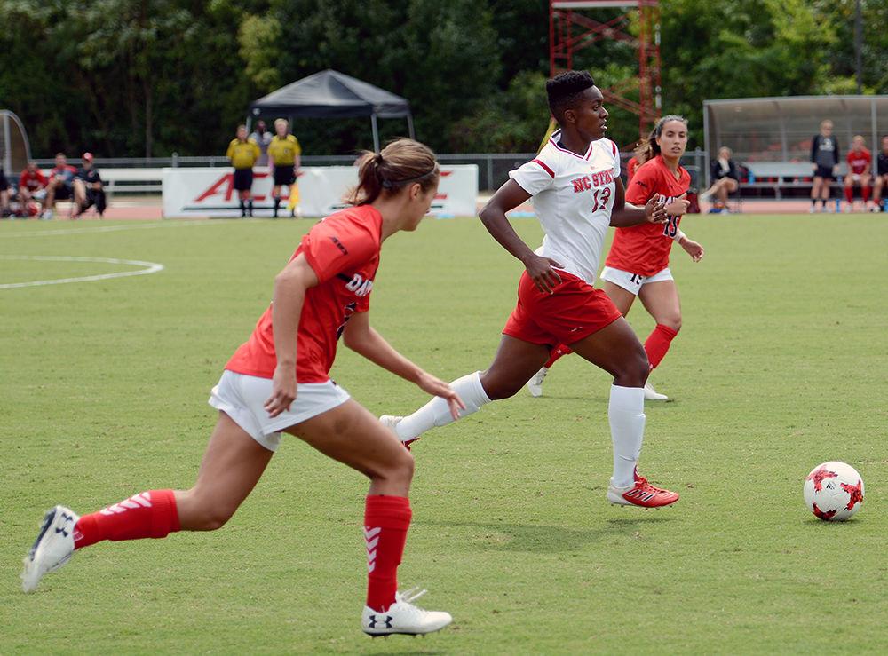 Junior defender Ella Bonner dribbles the ball ahead of a Davidson player. The NC State women's soccer team beat Davidson 4-0 at Dail Soccer Stadium on Sunday, Sept. 10.