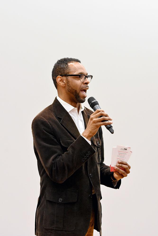Moses T. Alexander Greene, the director of the African American Cultural Center at NC State University, greets guests before showing "Chasing Trane," The John Coltrane documentary. The movie was screened at James B. Hunt Library Auditorium on Friday Sept 1st, 2017 co-presented by the African American Cultural Center as well as the non-profit organization Black Jedi Zulu.