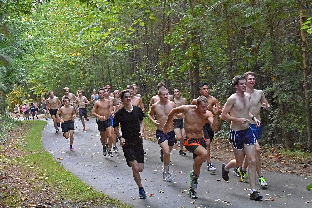 Practice for the Club Cross Country Team starts at Miller Fields before the runners make their way to another location. On Tuesday, members of the club made their way down the Greenway to what has been nicknamed "The Hill."