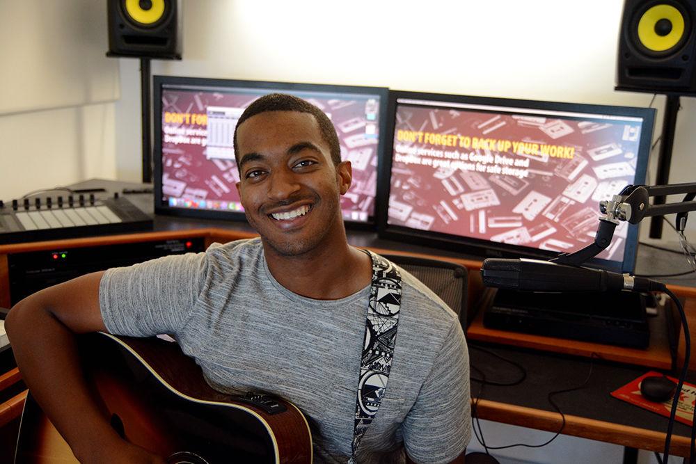 Local artist and NC State alumnus Kerry Long poses for a portrait in Recording Room D in Hunt Library on Sunday, Sept. 3. Long began his music career by playing gigs and open-mics around the Triangle.