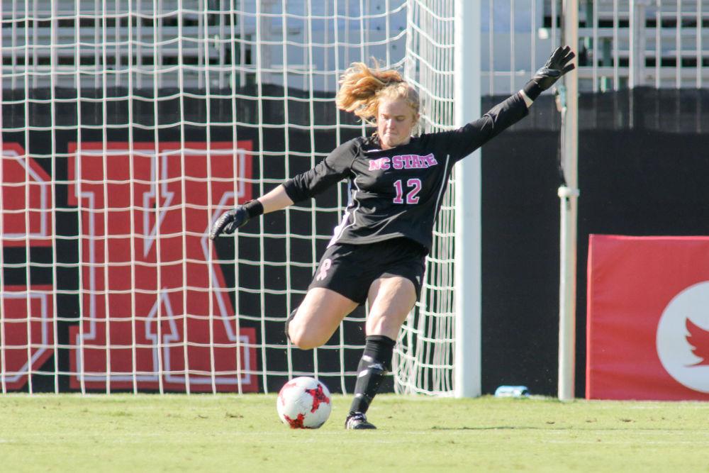Junior goalkeeper Sydney Wootten sends the ball back into play on Saturday, Oct. 14, 2017 in Dail Soccer Stadium. The Wolfpack beat Syracuse 3-1.