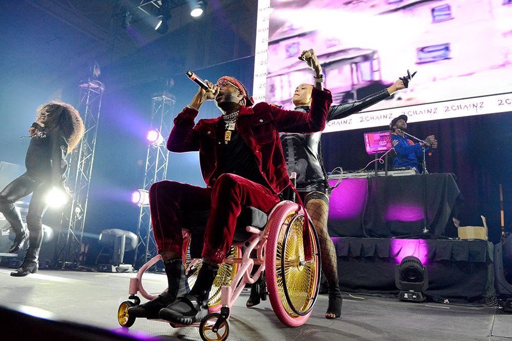 2 Chainz came to the stage in a pink and gold wheelchair Friday night for NC State's Homecoming concert. K Camp and DJ Trellz also performed earlier in the night. The Union Activities Board hosted this event Friday in Reynolds Coliseum.