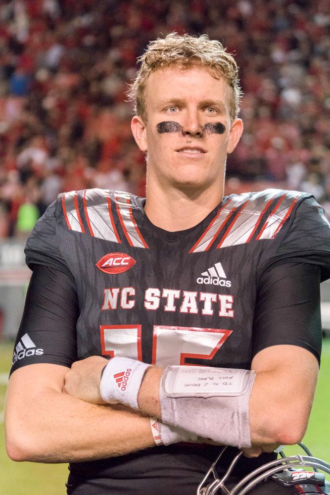 Redshirt junior quarterback Ryan Finley looks into the croud after the 39-25 win over Louisville in Carter-Finley Stadium on Thursday, October 5.