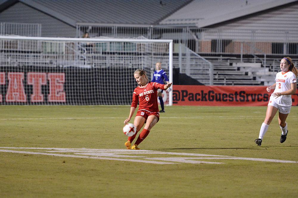Freshman defender Lulu Guttenberger clears the ball upfield during the game against the Clemson Tigers. The Wolfpack would go on to win the game 1-0 in Dail Soccer Stadium on Thursday.