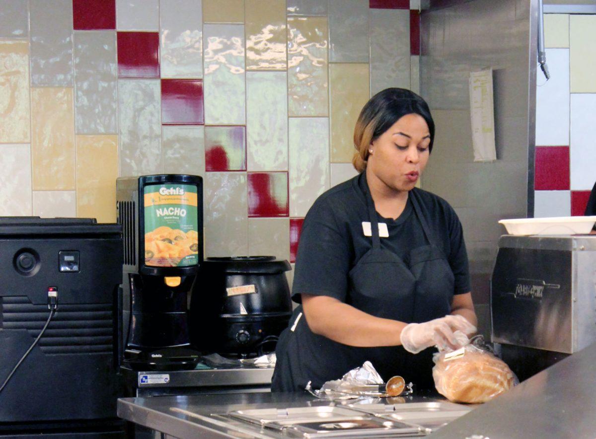 Candy Horton works at Tuffy's putting together meals at Talley Student Union on Tuesday, Oct. 3. Tuffy's Diner is a fast food venue where students can enjoy breakfast, lunch and dinner. &#160;