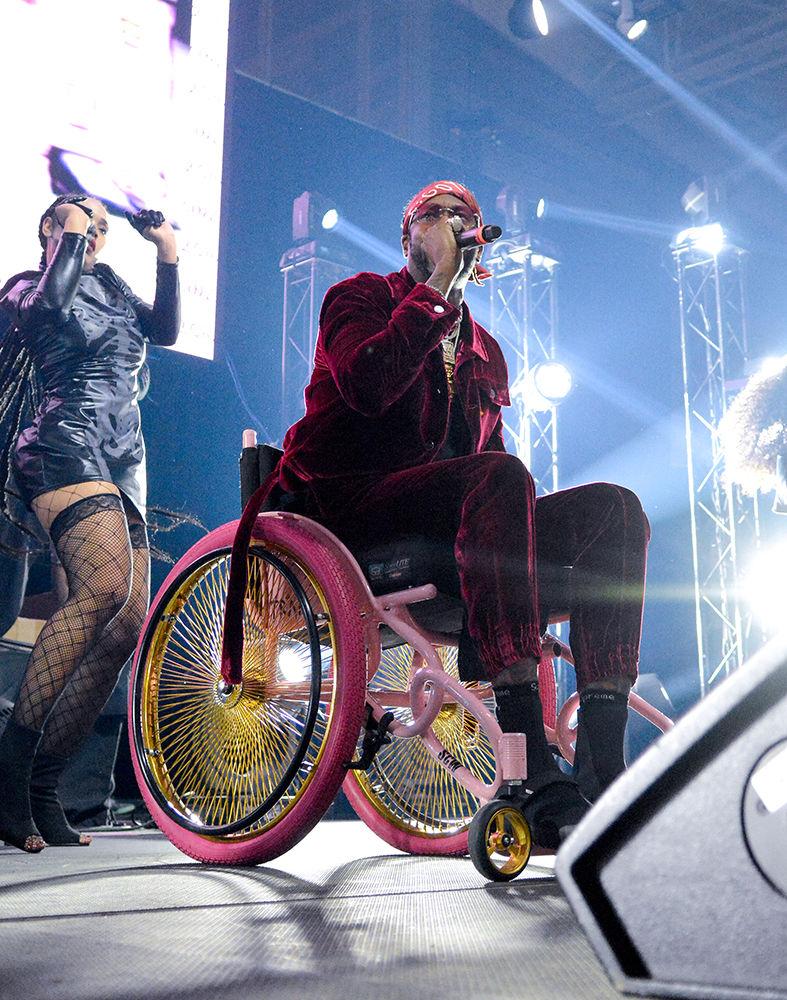 Rapper 2 Chainz takes the stage on a pink wheelchair after breaking his leg at the beginning of his tour. The NC State Homecoming Concert is organized by UAB as a part of Red and White week at NC State. The concert took place at Reynolds Coliseum on Friday, Oct. 27.