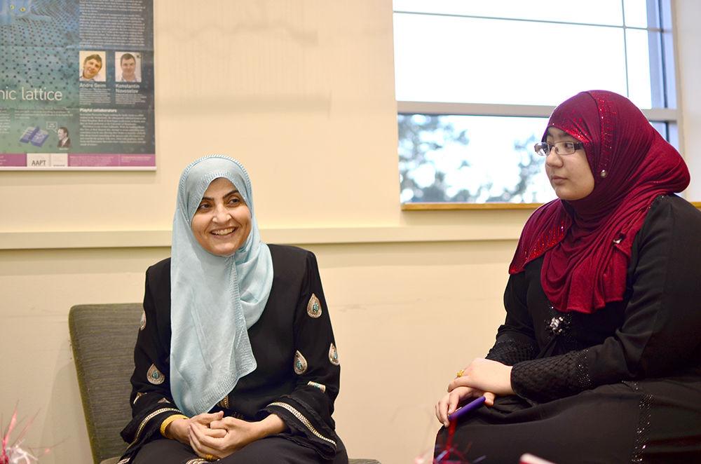 Guests to the university, Amal Khdour and Hebbah Sayed-Ahmed talk to other guests about women in the Muslim community, at the Islam Fair on Tuesday. The Islam Fair is a part of Diversity Education Week and is to raise awareness about Islamic culture as well as answer any questions that guests may have.