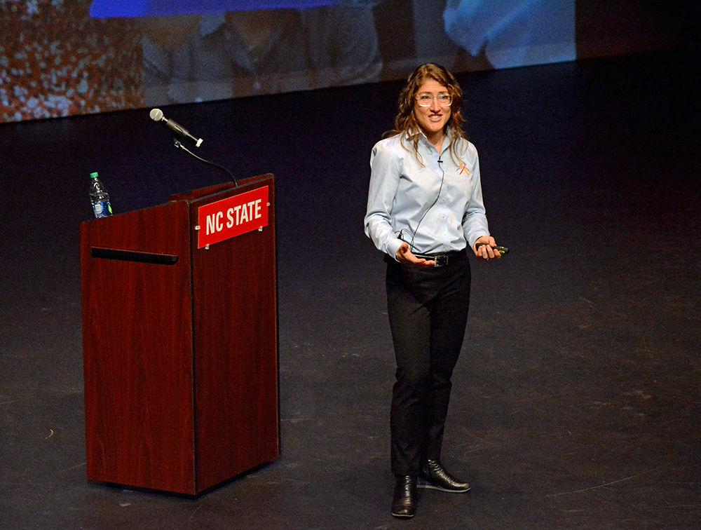 NC State alumna Christina Hammock Koch talks about making her dream of becoming an astronaut come true in Stewart Theatre on Monday. Koch said that her extracurricular activities of sailing and rock climbing were just as important as being an electrical engineer to be chosen as a NASA astronaut.