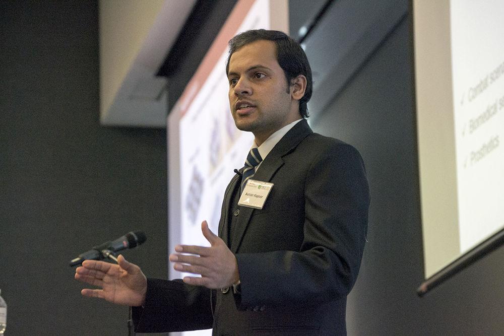 Ashish Kapoor, a Ph.D. student studying textile engineering, chemistry and science, gives his three-minute thesis in Hunt Library on Tuesday. Kapoor won the "People's Choice" award of $500.