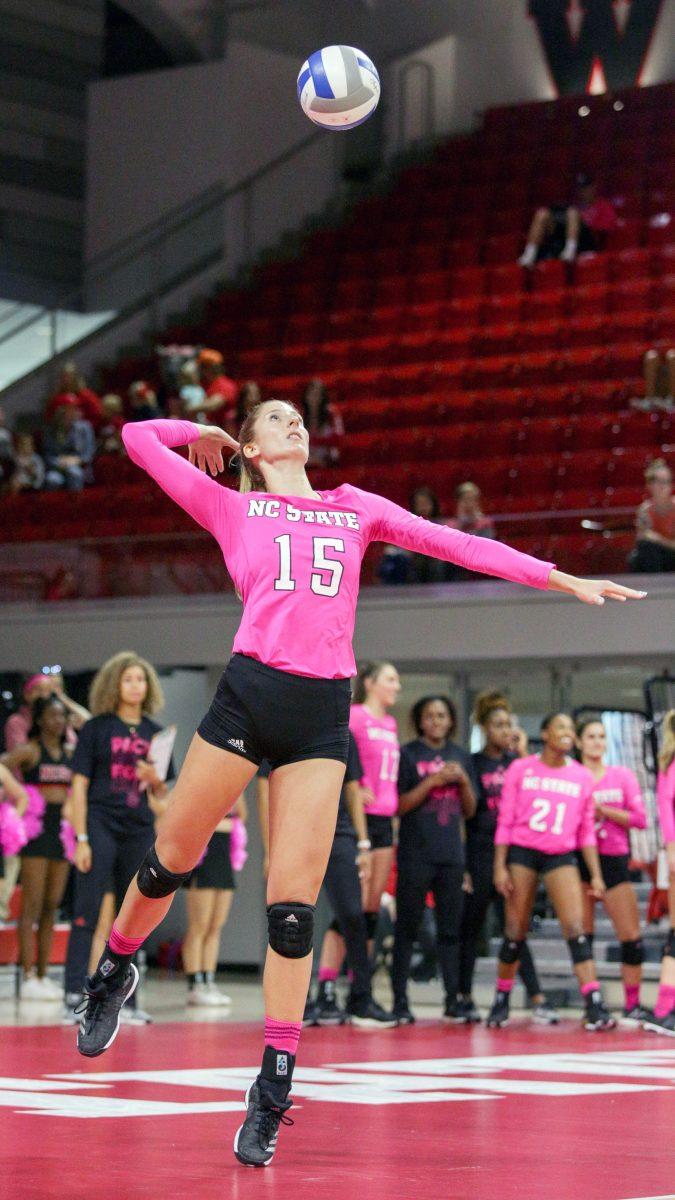 Senior middle blocker Kaitlyn Kearney serves during the 3-1 win over Virginia Tech on Sunday in Reynolds Coliseum.