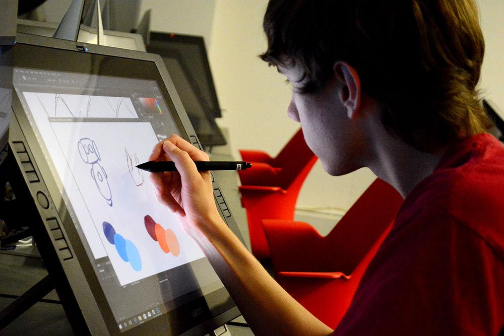 Cameron Martin, a third-year design studies student, selects colors from a palette during the Animation Academia club meeting on Oct. 4 in Brooks Hall. During the meeting, club members learned how to use Adobe Photoshop to create animations, which were then presented at the end on the meeting.