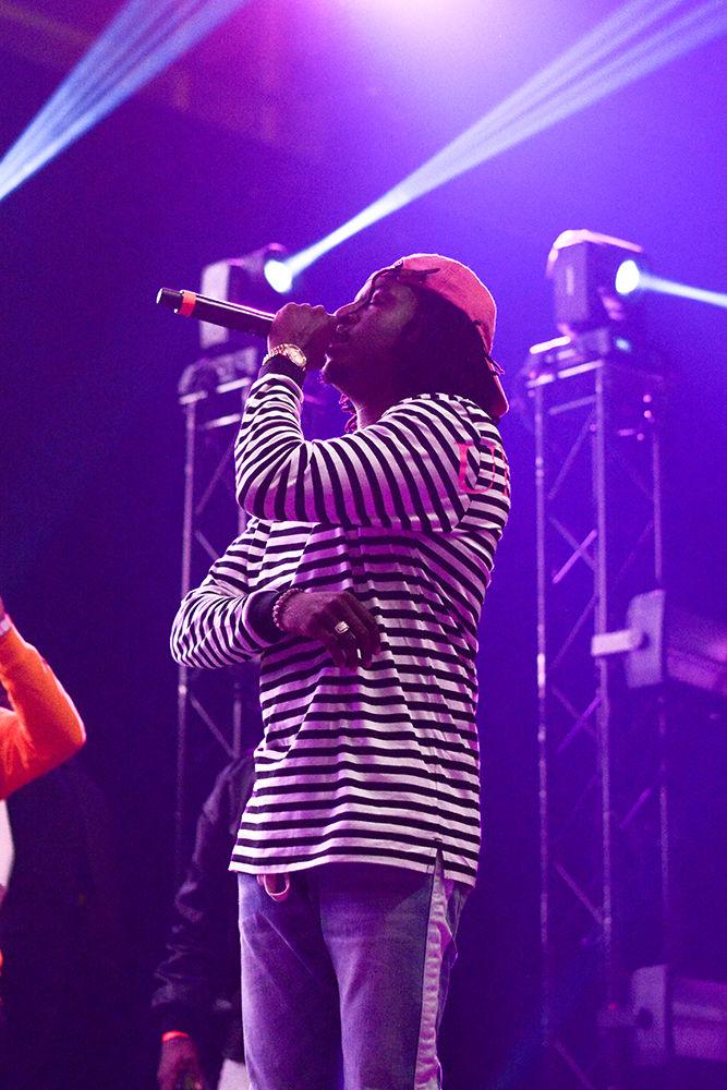K CAMP preforms while resting just for a moment before sprinting back into action. The NC State Homecoming Concert is organized by UAB as a part of Red and White week at NC State. The concert took place at Reynolds Coliseum on Friday, Oct. 27.