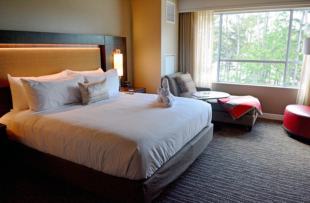 One of the 164 guest rooms in the StateView Hotel, which the hotel calls "dens." The hotel overlooks Lake Raleigh and opened to guests for the first time on Tuesday.