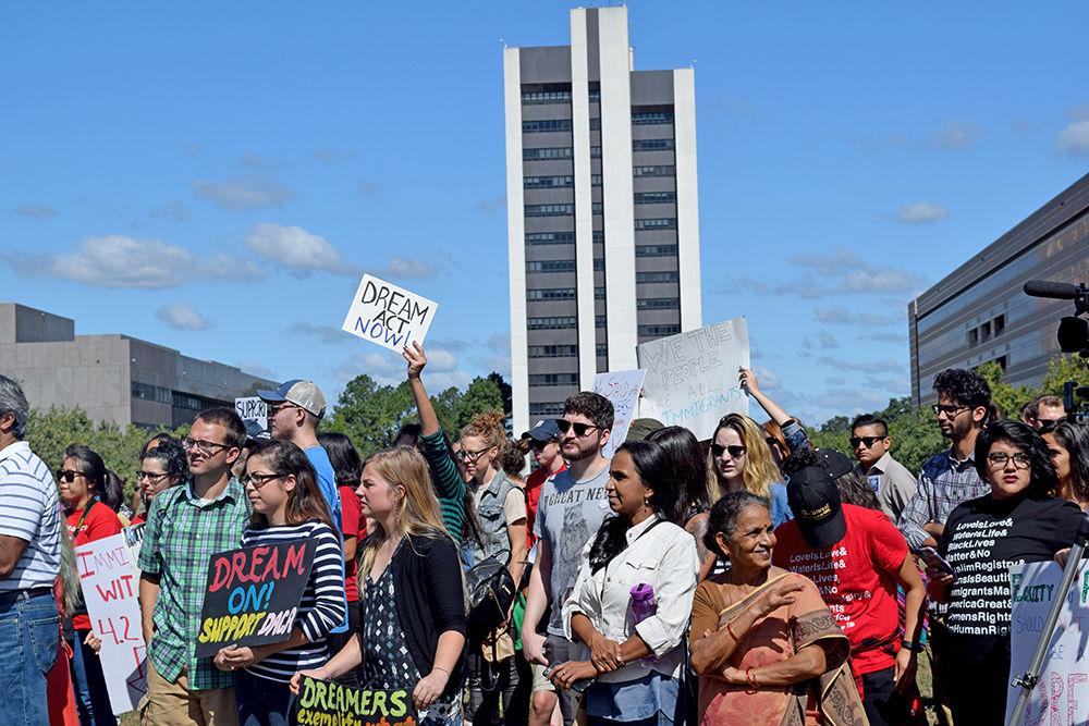 DACA rally members gather at Halifax Mall on Sunday to listen to speakers affected by Trump's decision to end DACA. Congressman Price was one of the several that spoke regarding the importance of DACA, in downtown Raleigh. Two NC State students organized the event, and several people who depend on DACA shared their stories.