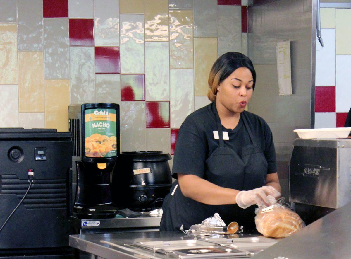 Candy Horton works at Tuffy's putting together meals at Talley Student Union on Tuesday, Oct. 3. Tuffy's Diner is a fast food venue where students can enjoy breakfast, lunch and dinner. &#160;