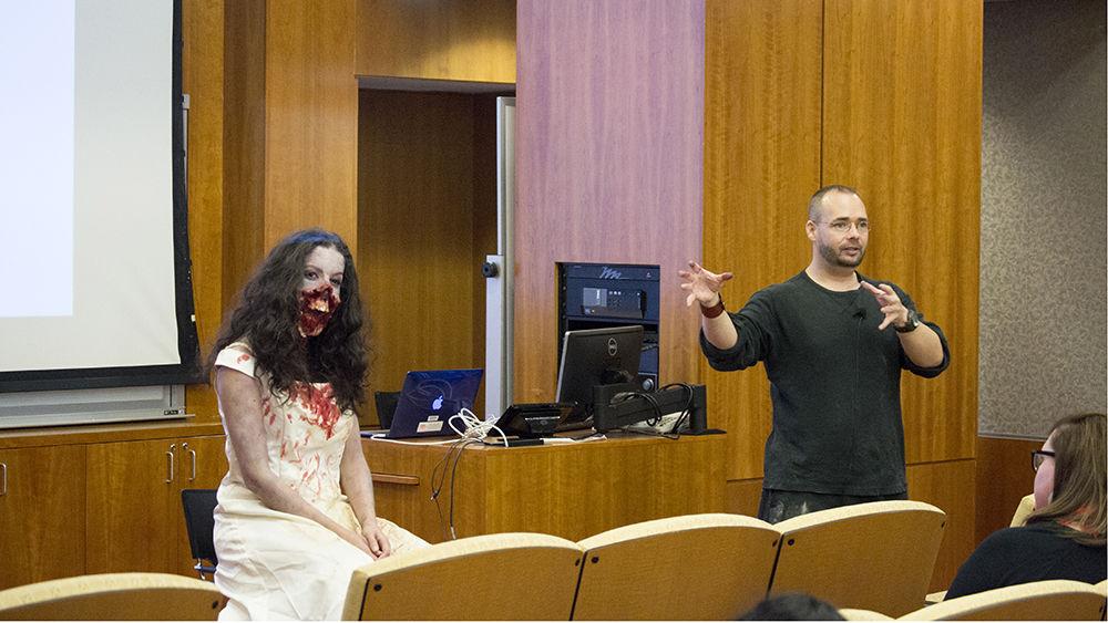 Special effects makeup artist Gregory Hewett, owner of GregoryFX, speaks to an audience of students about his work, success and philosophy in D.H. Hill auditorium on Wednesday, Oct. 25. Hewett has a "no secrets" philosophy, since he was ignored by professionals in his youth, and trains aspiring effects artists of all ages.