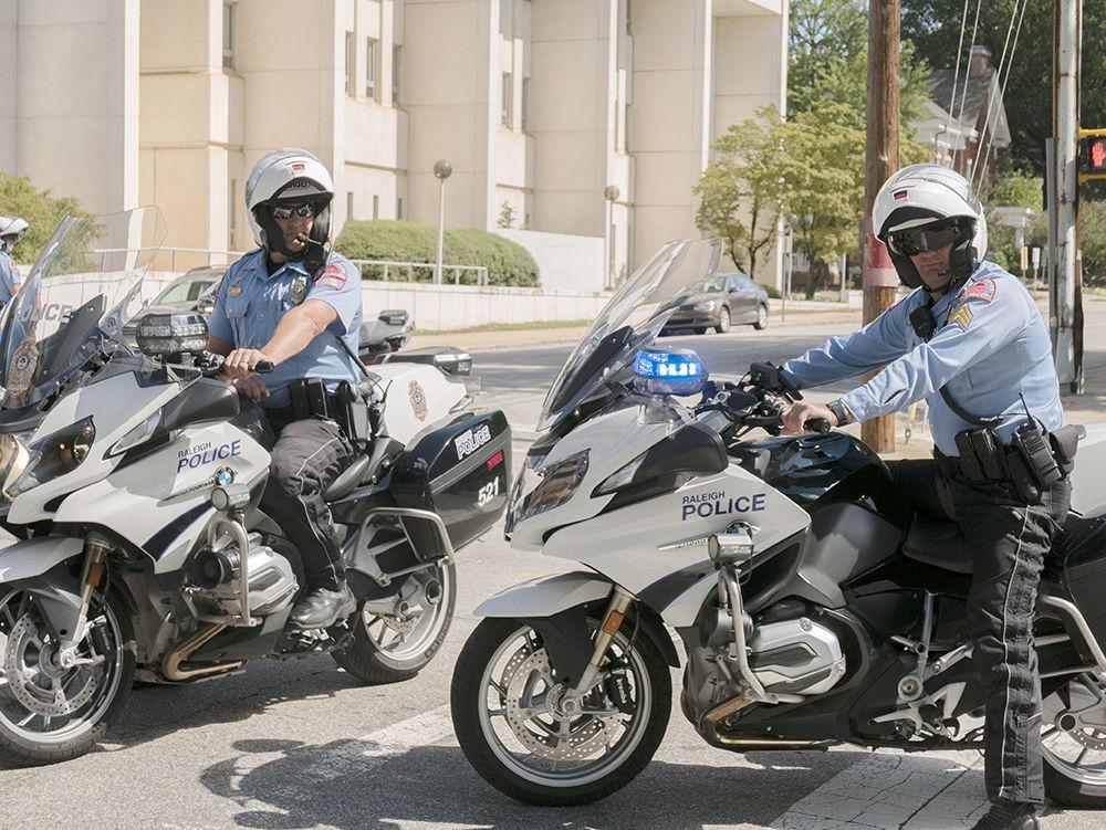 Raleigh police block automobile traffic and watch over the march in downtown Raleigh, NC on Sunday, Sept. 30. The DACA march&#160;was organized by two second-year NC State students, Jasmine Wang who is studying computer science, and Sindhoor Ambati, studying biomedical engineering and English.