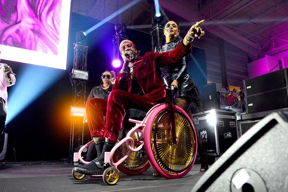 2 Chainz came to the stage in a pink and gold wheelchair Friday night for NC State's Homecoming concert. K Camp and DJ Trellz also performed earlier in the night. The Union Activities Board hosted this event on Oct. 27 in Reynolds Coliseum.