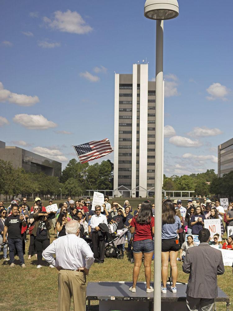 Event organizers Jasmine Wang and Sindhoor Ambati talk DACA supporters at a rally with congressman David Price waiting to address the crowd in Downtown Raleigh, NC on Sunday October 1, 2017. Ambati and Wang are booth second year NC State students. Wang is studying Computer Science and Ambati studying English and biomedical engineering. They both say " out hearts are full seeing the Triangle coming out to support DACA and immigrants".