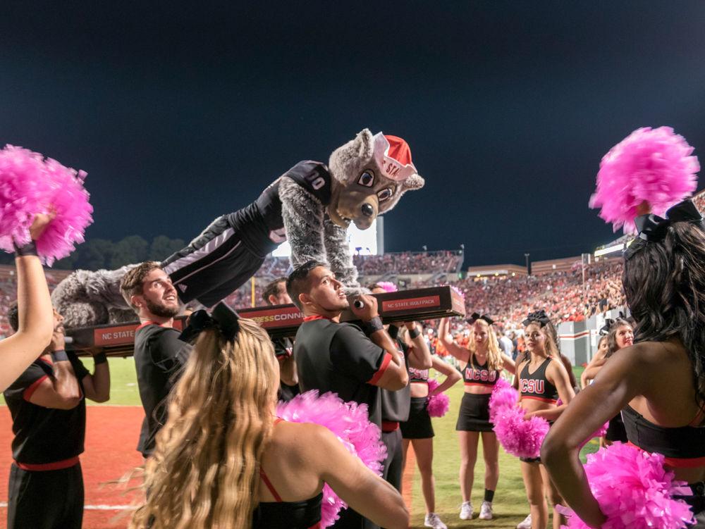 Mr Wuff does push ups after a touchdown in the 39-25 win over Louisville in Carter-Finley Stadium on Thursday, October 5
