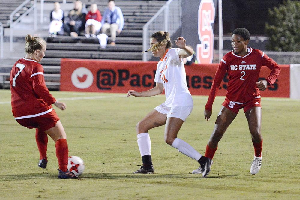 Sophmore midfielders Ricci Walkling and Tziarra King defend a Clemson forward. The Wolfpack would go on to win the game 1-0 in Dail Soccer Stadium on Thursday.