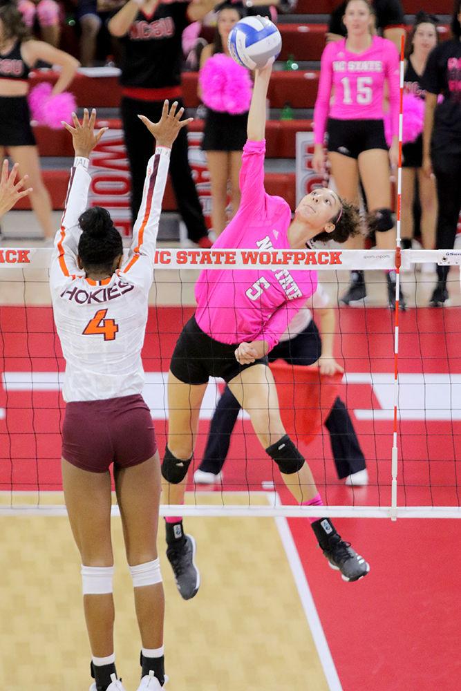 Graduate outside hitter Bree Bailey goes up for a kill. Bailey had 17 kills during the 3-1 win over Virginia Tech on Sunday in Reynolds Coliseum.