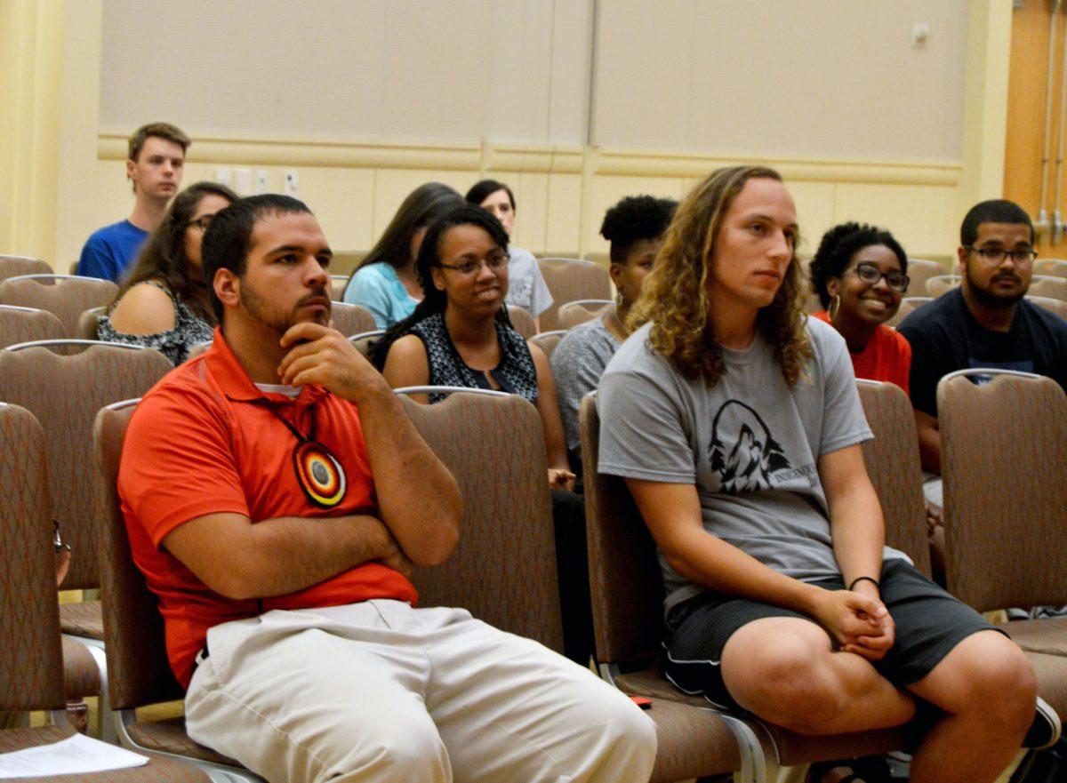 Jacob Jacobs, a fifth-year studying chemical engineering, and Liam Locklear, a second-year in the College of Engineering, listen to the panel discussion during Indigenous Peoples' Day on Monday in Talley Student Union. Native American Student Affairs (NASA) initiated the Indigenous People's Day event to commemorate the history of Native Americans and their culture.