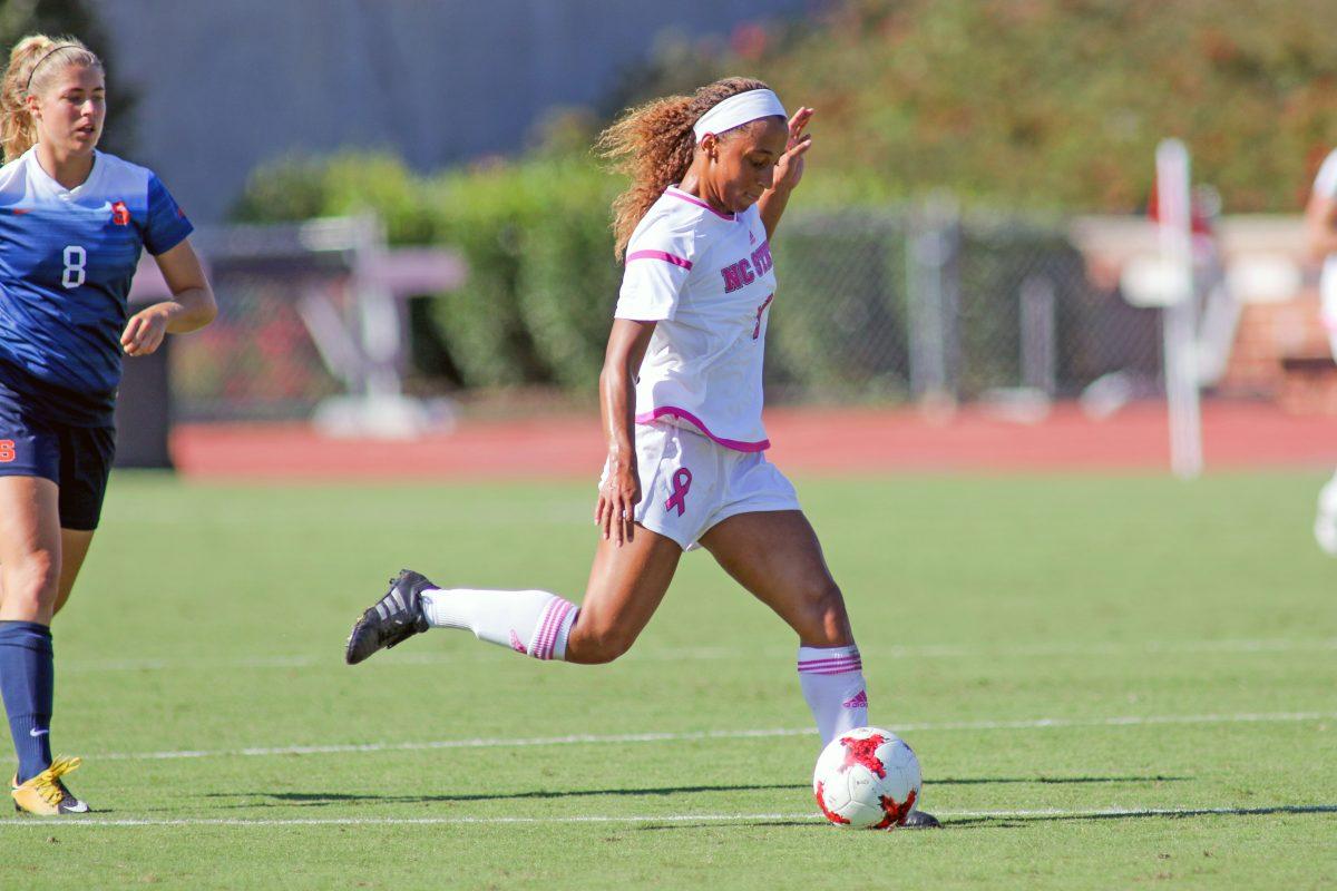 Junior forward Maxine Blackwood splits the defense to bring the ball upfield during the 3-0 win over Syracuse on Oct. 14 in Dail Soccer Stadium.