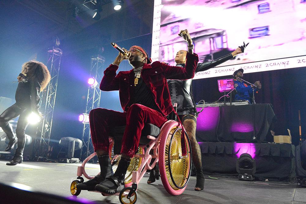 2 Chainz came to the stage in a pink and gold wheelchair Friday night for NC State's Homecoming concert. K Camp and DJ Trellz also performed earlier in the night. The Union Activies Board hosted this event on Friday, Oct. 27, in Reynolds Coliseum.