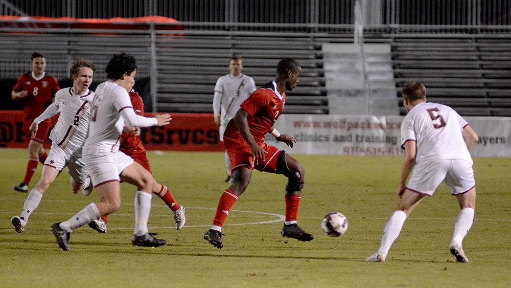 Redshirt junior forward Ade Taiwo receives a pass from a teammate during the NC State vs. Boston College men's soccer game at Dail Soccer Stadium on Friday, Oct. 27. The Wolfpack drew with the Golden Eagles after overtime with a score of 0-0.
