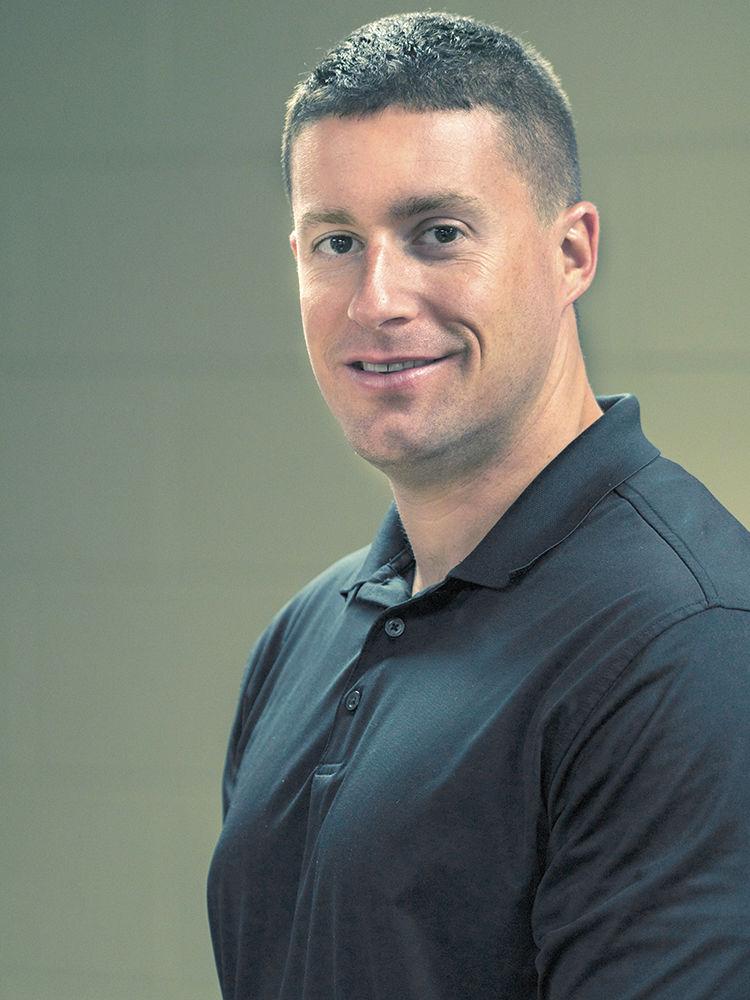 Director of Military and Veteran Services Nick Drake poses for a portrait in the Military and Veteran Center on Oct. 3. "I am passionate about serving veterans. I have had some challenges early on with separation from the service and college, so I feel that it is important that we provide the necessary support so our Vets can be successful," Drake said. The Military and Veteran Resource Center opened in November 2016.&#160;
