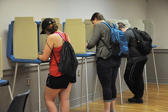 Members of the Wolfpack fill out their ballot sheets with their selections at Pullen Community Center on Tuesday, March 15, 2016.