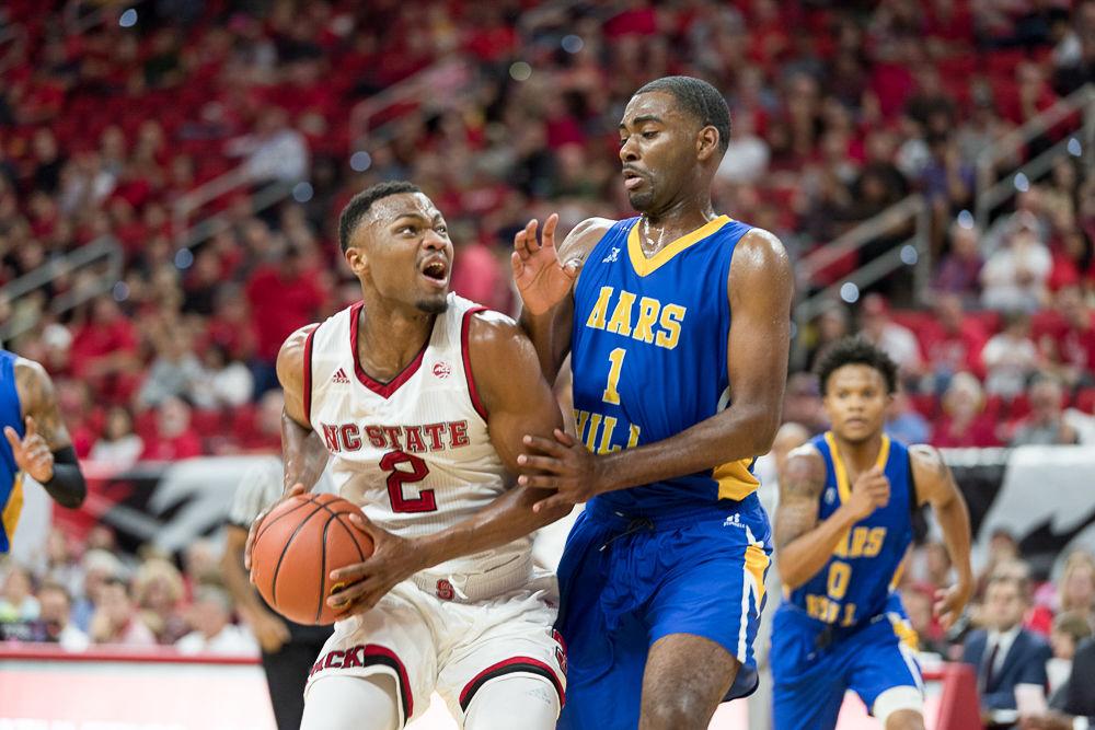 Redshirt Junior guard Torin Dorn gets redy for a 2 point shot against Mars Hill durring an exhibition at PNC Arena on Friday November 3.