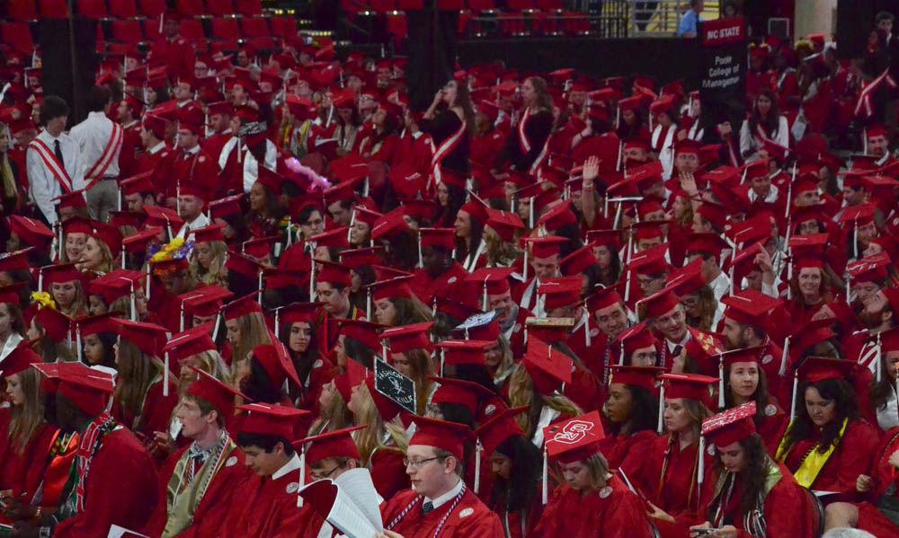 The center of PNC Arena fills up as graduates of NC State file in for their graduation ceremony on Saturday, May 13. This group of students, combined with the students who had graduated the previous winter, consisted of the most degrees conferred yet in a single academic school year.