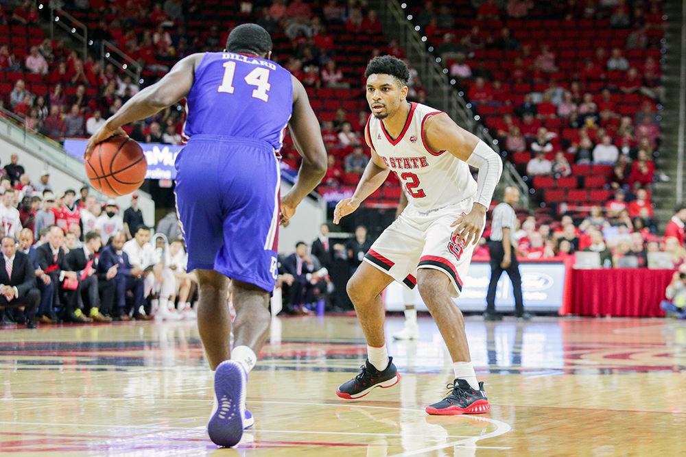 Graduate transfer guard Allerick Freeman puts the pressure on defending the entire length of the court during the 86-68 win over Presbyterian College on Nov. 16 in PNC Arena.