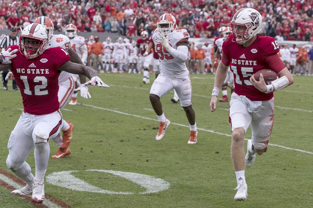redshirt graduate transfer Ryan Finley completes a 12 yard rush for a first down against Clemson. The Wolfpack lost 31-38 against the Tigers on Saturday November4 at Carter-Finley Stadium.