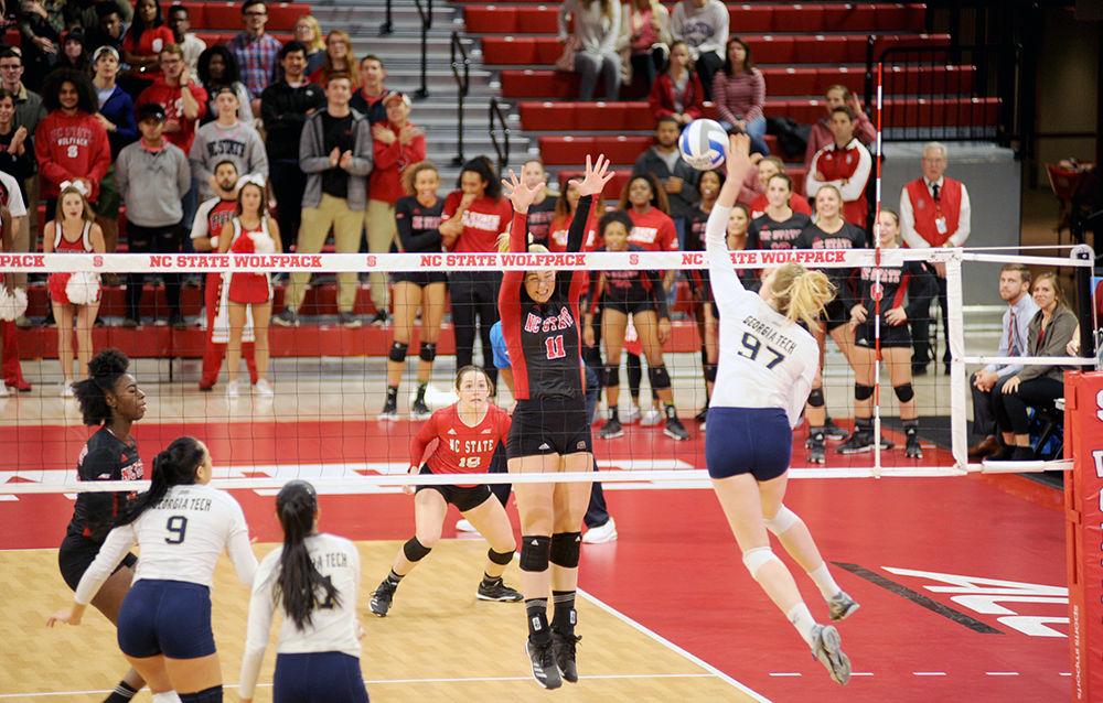 Senior outside hitter Julia Brown jumps up for a block against Georgia Tech on Nov. 11 at Reynolds Coliseum. The NC State Women's Volleyball Team went on to win over Georgia Tech 3-0.