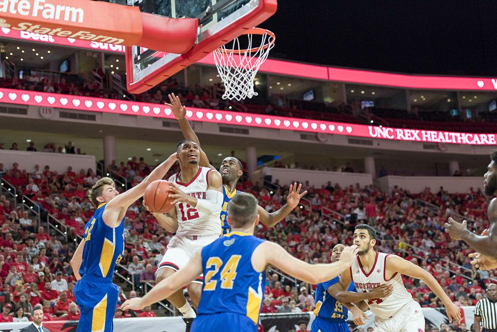 Graduate transfer guard Allerick Freeman goes up for a layup against Mars Hill durring an exhibition game at PNC Arena on Friday November 3.