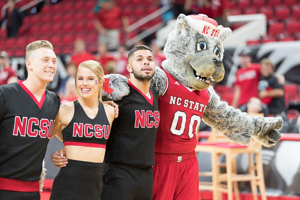 Mr. Wuff sings the Alma Mater with the NC State Chearleaders after the 109-66 win durring an ehibition against Mars Hill at PNC Area on Friday November 3.
