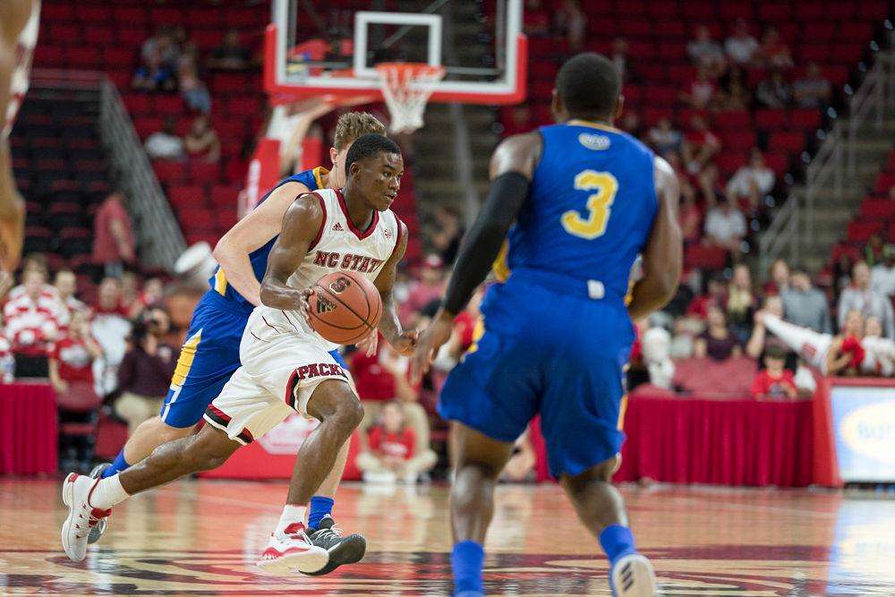 Sophmore guard Markell Johnson runs down the court durring an exhibition game against Mars Hill at PNC Arena on Friday November 3.