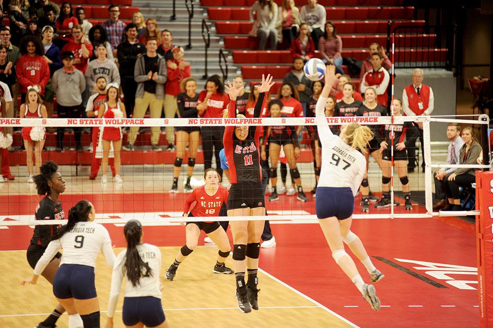 Senior outside hitter Julia Brown jumps up to block an oncoming ball at the NC State women's volleyball vs. Georgia Tech game on Nov. 11 at Reynolds Coliseum. The NC State women's volleyball team went on to win over Georgia Tech 3-0.