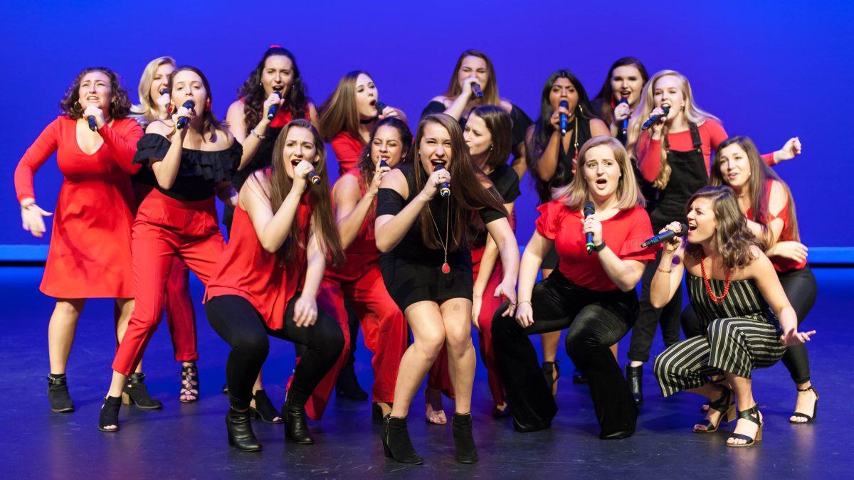 Ladies in Red, NC State's all-female a cappella group, performs at their fall concert on Saturday in Stewart Theatre.