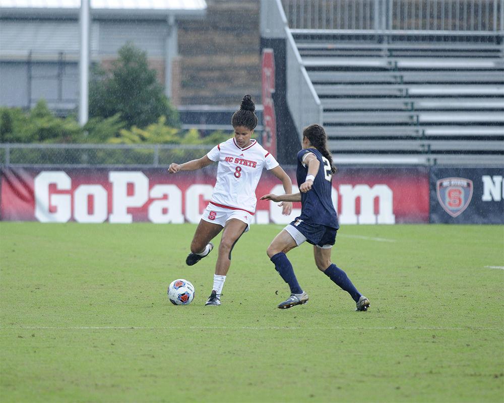 Sophomore forward Kia Rankin kicks the ball past an opponent from Notre Dame at the N.C. State vs. Notre Dame women's soccer ACC quarter final in Dail Soccer Stadium on Sunday Oct.29. N.C. State defeated the visitors from Notre Dame with a final score of 4-1.