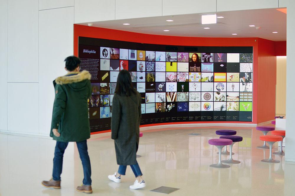 College of Design multimedia projects are displayed on the video walls of Hunt Library on Sunday. The Fall Student Showcase began Nov. 27 and will run through Dec. 17.