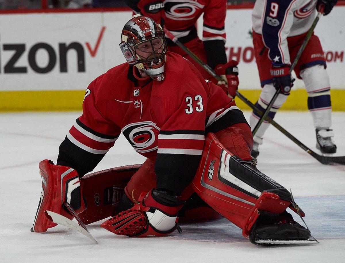 Goaltender Scott Darling watches play after deflecting a shot on goal in the second period against Columbus at PNC Arena on Saturday. Darling made 35 saves against 36 shots on goal. The Canes won 2-1 for Darling's first career win against Columbus.