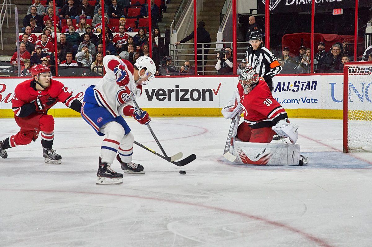 Hurricanes goalie Cam Ward prepares to stop a shot from Canadiens left wing Charles Hudon during a breakaway in the second period at PNC Arena on Wednesday, Dec. 27 for a 3-1&#160; Carolina win. Ward has won five straight games and is now 8-0-1 in his last 10 games.&#160;