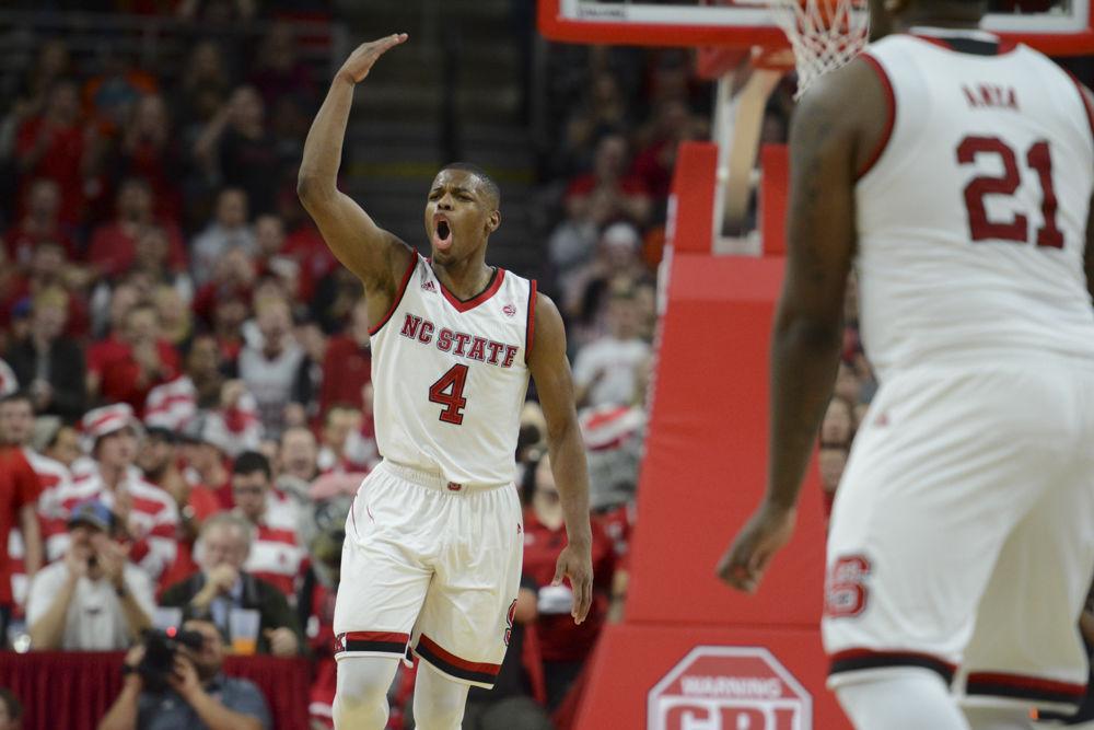 Freshman guard Dennis Smith Jr. celebrates in the Wolfpack's 104-78 win over Virginia Tech on Jan. 4, 2017. Smith posted the first triple double in ACC play in school history with 27 points, 11 rebounds and 11 assists in the win at PNC Arena.